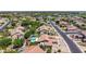 Aerial view of a suburban home featuring a private pool, lush backyard, and well-manicured landscaping at 3060 E Hope St, Mesa, AZ 85213