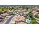 Neighborhood aerial view with lush green trees, multiple homes, and a community park at 3060 E Hope St, Mesa, AZ 85213
