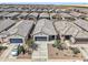 An aerial view of a neighborhood with desert landscaping at 35266 W San Sisto Ave, Maricopa, AZ 85138