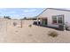 Spacious backyard with a block wall at 35266 W San Sisto Ave, Maricopa, AZ 85138
