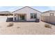 Gravel backyard with covered patio at 35266 W San Sisto Ave, Maricopa, AZ 85138
