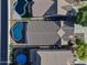 Birds eye view of neighborhood featuring blue in-ground pool and fenced yard at 35721 N Zachary Rd, Queen Creek, AZ 85144
