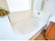 Bright bathroom featuring a soaking tub and stylish fixtures at 35721 N Zachary Rd, Queen Creek, AZ 85144