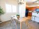 Cozy dining room with natural light and stylish decor at 35721 N Zachary Rd, Queen Creek, AZ 85144