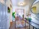 Welcoming foyer with stylish decor, tile flooring, and a view into the living area at 35721 N Zachary Rd, Queen Creek, AZ 85144