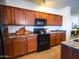 Well-appointed kitchen with stainless steel appliances and generous counter space at 35721 N Zachary Rd, Queen Creek, AZ 85144