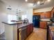 Well-equipped kitchen with stainless steel appliances and ample counter space for cooking at 35721 N Zachary Rd, Queen Creek, AZ 85144