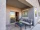 Cozy covered patio with comfortable seating and outdoor decor at 35721 N Zachary Rd, Queen Creek, AZ 85144