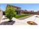 Backyard featuring manicured lawn and low-maintenance landscaping, ideal for outdoor enjoyment and relaxation at 36114 W Vera Cruz Dr, Maricopa, AZ 85138