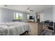 Spacious main bedroom with a ceiling fan, and an ensuite bathroom, providing a peaceful retreat at 36114 W Vera Cruz Dr, Maricopa, AZ 85138