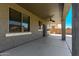 Covered patio with a ceiling fan and views of the exterior backyard at 36114 W Vera Cruz Dr, Maricopa, AZ 85138