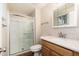 Clean bathroom with a glass-enclosed shower and modern vanity at 3624 E Hearn Rd, Phoenix, AZ 85032