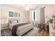 Beautifully staged bedroom with tasteful decor and ample natural light at 3624 E Hearn Rd, Phoenix, AZ 85032