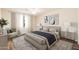 Beautiful bedroom featuring tasteful decor, an area rug, and soft lighting at 3624 E Hearn Rd, Phoenix, AZ 85032