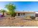 Charming single-story home with desert landscaping, appealing front facade, and a two-car garage at 3624 E Hearn Rd, Phoenix, AZ 85032