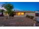Charming single-story home with a landscaped front yard and an attached two-car garage at 3624 E Hearn Rd, Phoenix, AZ 85032