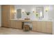 A sleek bathroom features dual sinks, wood cabinets, and ample countertop space at 4107 E Edgemont Ave, Phoenix, AZ 85008