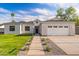 Beautiful home with a well-maintained front yard, featuring modern design and a welcoming entrance at 4107 E Edgemont Ave, Phoenix, AZ 85008