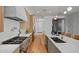 Well-equipped kitchen features stainless steel appliances, an island with seating, and ample countertops at 4107 E Edgemont Ave, Phoenix, AZ 85008