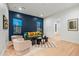 Stylish living room with an accent wall, plush seating, and modern decor at 4107 E Edgemont Ave, Phoenix, AZ 85008