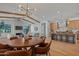 Open living space with hardwood floors combines living, dining and kitchen at 4107 E Edgemont Ave, Phoenix, AZ 85008