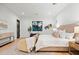 Inviting main bedroom boasts a comfortable seating arrangement and a calming view from the window at 4107 E Edgemont Ave, Phoenix, AZ 85008