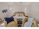 Inviting bedroom featuring a plush bed, warm lighting, and comfortable seating area at 4107 E Edgemont Ave, Phoenix, AZ 85008
