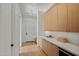 Convenient mud room with built-in cabinets and countertop space at 4107 E Edgemont Ave, Phoenix, AZ 85008