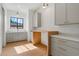 Pantry with gray cabinets, white countertops, and hardwood floors at 4107 E Edgemont Ave, Phoenix, AZ 85008
