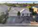 Aerial view of a well-kept home featuring desert-friendly landscaping, tiled roof, and inviting curb appeal at 418 W Sagebrush St, Gilbert, AZ 85233