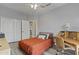 Inviting bedroom with a bed, desk, and ample storage, creating a cozy and functional space at 418 W Sagebrush St, Gilbert, AZ 85233