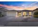 Charming single-story home with a two-car garage and lovely desert landscaping at 418 W Sagebrush St, Gilbert, AZ 85233