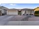 Charming single-story home with a well-manicured front yard and inviting curb appeal at 418 W Sagebrush St, Gilbert, AZ 85233