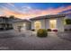 Beautiful single-story home with attractive rock landscaping, mature plants, and a desert-friendly yard at 418 W Sagebrush St, Gilbert, AZ 85233