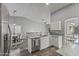 Stylish kitchen features granite countertops, stainless steel appliances, and wood-look floors at 418 W Sagebrush St, Gilbert, AZ 85233