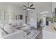 Open-concept living room with contemporary decor, vaulted ceilings, and stylish furnishings at 418 W Sagebrush St, Gilbert, AZ 85233