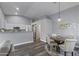 Inviting living space with an open kitchen, dining area, and modern decor throughout at 418 W Sagebrush St, Gilbert, AZ 85233