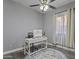 Cozy home office with a white desk, computer setup, and a comfortable chair, perfect for remote work at 418 W Sagebrush St, Gilbert, AZ 85233