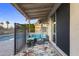 Inviting covered patio with comfortable seating near a refreshing pool at 418 W Sagebrush St, Gilbert, AZ 85233