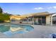Beautiful backyard pool area with patio and covered seating, perfect for entertaining at 418 W Sagebrush St, Gilbert, AZ 85233