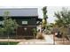 Backyard with metal accents, a dining area, and manicured landscaping at 419 W 11Th St, Tempe, AZ 85281