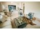 Open-concept living area featuring stylish furnishings, hardwood floors, and seamless flow into the kitchen at 419 W 11Th St, Tempe, AZ 85281