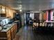 Open-concept living room and dining area provides comfortable space for relaxation and entertainment at 4211 W Roosevelt St # 235, Phoenix, AZ 85009