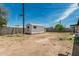 Backyard with storage shed, block fence, and blue skies at 4531 N 12Th Dr, Phoenix, AZ 85013