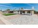 Beautiful home with a lush lawn, solar panels, a stylish walkway, and ample parking space at 4531 N 12Th Dr, Phoenix, AZ 85013