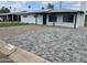 The home's front exterior has been freshly renovated with paved driveway at 4531 N 12Th Dr, Phoenix, AZ 85013