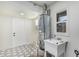Bright laundry room with utility sink and water heater at 4531 N 12Th Dr, Phoenix, AZ 85013