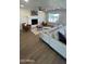 Inviting living room with a white brick fireplace and modern furnishings at 4531 N 12Th Dr, Phoenix, AZ 85013