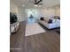 Open-concept living room with hardwood floors and contemporary decor at 4531 N 12Th Dr, Phoenix, AZ 85013