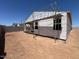 Backyard view of a home under construction with scaffolding and partially completed exterior walls at 47720 W Kenner Dr, Maricopa, AZ 85139